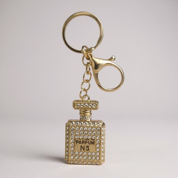 None Accessories - Gold Parfum Rhinestone charm keys or bags with gold accents